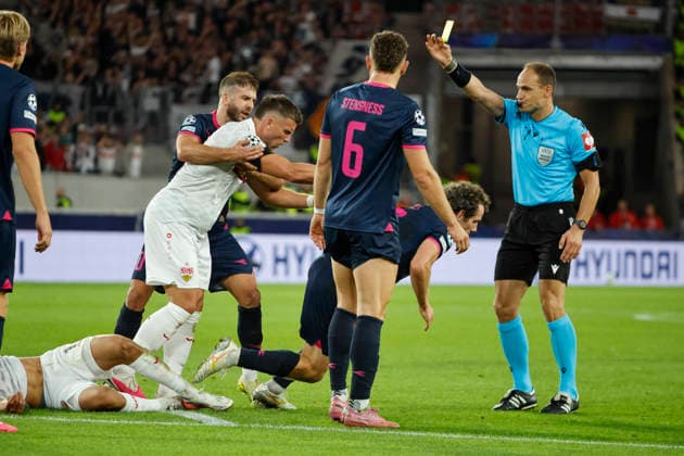 Ermedin Demirovic of VfB Stuttgart, No. 09, tackles Joe Bell of Viking Stavanger, No. 08, and Joe Bell of Viking Stavanger, No. 08, receives a yellow card from referee Nenad Minakovic (SRB) for a foul on Bilal El Khannouss of VfB Stuttgart, 11, Germany, Soccer, UEFA Champions League, Matchday 1, 2026–2027, VfB Stuttgart vs. Viking Stavanger, September 9, 2026, Stuttgart Arena, Stuttgart, Germany Copyright: xGrantxHubbsx