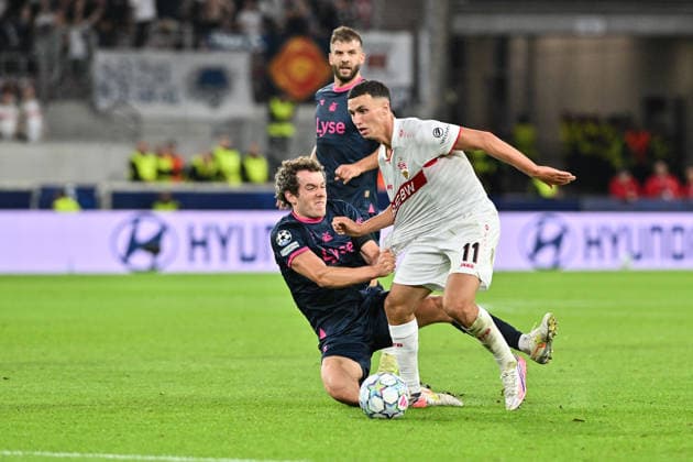 STUTTGART, GERMANY; 09. SEPTEMBER: tackle between Bilal EL KHANNOUSS (VfB Stuttgart 11) and Joe BELL (Viking FK 8) during the Champions League Match between VfB Stuttgart vs. Viking FK at Matchday 1 at MHP-Arena Copyright: xBEAUTIFULxSPORTS Goldbergx
