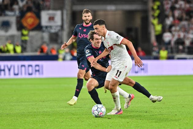 STUTTGART, GERMANY; 09. SEPTEMBER: tackle between Bilal EL KHANNOUSS (VfB Stuttgart 11) and Joe BELL (Viking FK 8) during the Champions League Match between VfB Stuttgart vs. Viking FK at Matchday 1 at MHP-Arena Copyright: xBEAUTIFULxSPORTS Goldbergx