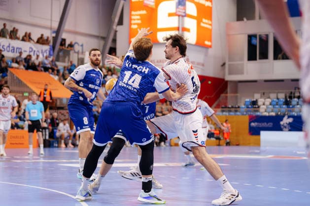 2 Handball Bundesliga 2, Matchday 1: VfL Potsdam vs. TV 05 07 Hüttenberg. A duel between Max Günther (1, VfL Potsdam) and Vit Reichl (14, TV 05 07 Hüttenberg), 19, on September 9, 2026, at the MBS Arena, Potsdam, Brandenburg, Germany