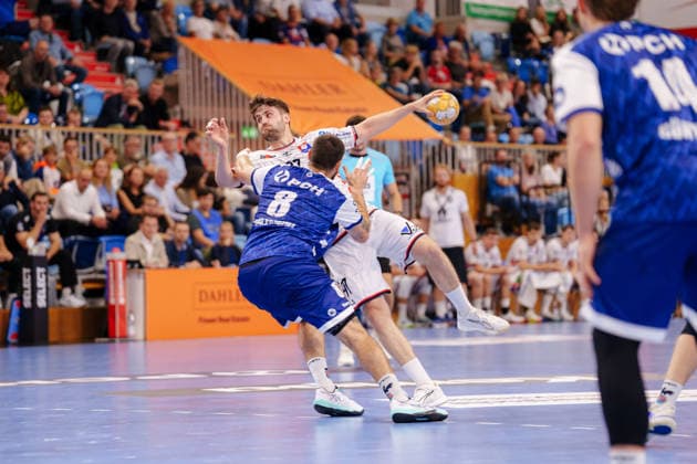 2 Handball Bundesliga 2, Matchday 1: VfL Potsdam vs. TV 05 07 Hüttenberg. A duel between Davide Bulzamini (No. 8, VfL Potsdam) and Danil Dyatlov (TV 05 07 Hüttenberg), 47 on September 9, 2026, at the MBS Arena, Potsdam, Brandenburg, Germany