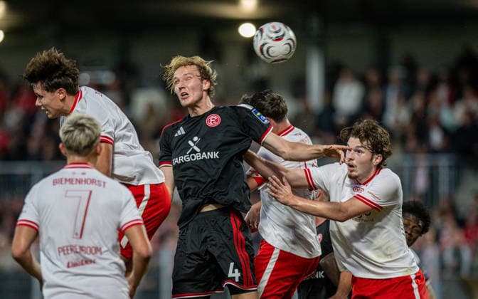 Soccer, 2026–2027 Season, Lower Rhine Cup, September 9, 2026, First Round, Men s, SV Biemenhorst White vs. Fortuna Düsseldorf Black; from left: Ferdinand Schulte (SV Biemenhorst), Lukas Bornschein (Fortuna Düsseldorf), Erik Monkos (SV Biemenhorst); Bocholt, Stadion am Huenting, Germany 260909_fb_sv-biemenhorst_fortuna-duesseldorf_58642