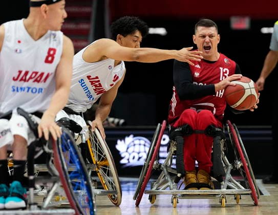 September 9, 2026, Ottawa, On, Canada: Poland s Piotr Pawelko (13) shouts as he tries to keep the ball from Japan s Yoshinobu Takamatsu (4) during first half of IWBF Wheelchair Basketball World Championships group stage action, in Ottawa, on Wednesday, Sept. 9, 2026. Canada News - September 9, 2026  - ZUMAc35_ 20260909_zaf_c35_027 Copyright: xJustinxTangx