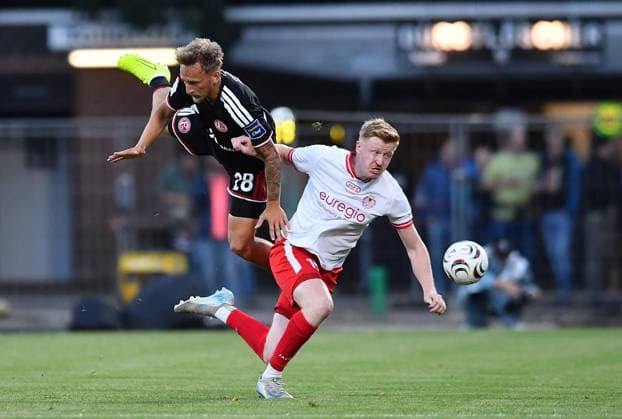 SV Biemenhorst vs. Fortuna Düsseldorf ** FOR EDITORIAL USE ONLY ** EDITORIAL USE ONLY ** p Lower Rhine Soccer Cup, 1st Round: SV Biemenhorst vs. Fortuna Düsseldorf on September 9, 2026, at Praemiun Park am Hünting in Bocholt. Sascha Risch (Fortuna Düsseldorf), above; Luca Schanzmann (SV Biemenhorst), below: Germany, North Rhine-Westphalia, Bocholt. Copyright ThorstenxTillmann Copyright: ThorstenxTillmann doc87j3ukl5yozkhu69klv ,EDITORIAL USE ONLY Copyright: ThorstenxTillmann