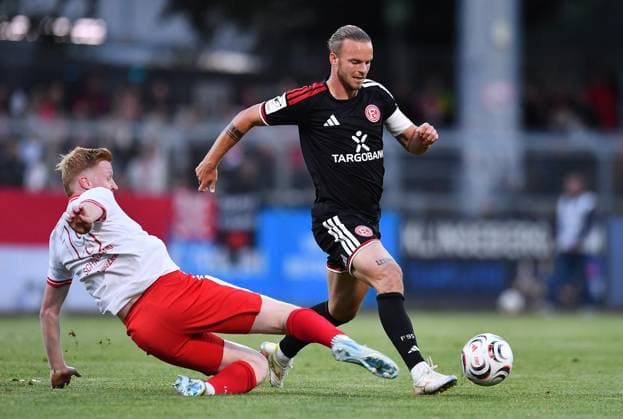 SV Biemenhorst vs. Fortuna Düsseldorf ** FOR EDITORIAL USE ONLY ** EDITORIAL USE ONLY ** p Lower Rhine Soccer Cup, 1st Round: SV Biemenhorst vs. Fortuna Düsseldorf on September 9, 2026, at Praemiun Park am Hünting in Bocholt. Luca Schanzmann (SV Biemenhorst), on the left: Jorrit Hendrix, Fortuna Düsseldorf; on the right: Bocholt, North Rhine-Westphalia, Germany. Copyright ThorstenxTillmann Copyright: ThorstenxTillmann doc87j3ukwqik06epshgll ,EDITORIAL USE ONLY Copyright: ThorstenxTillmann