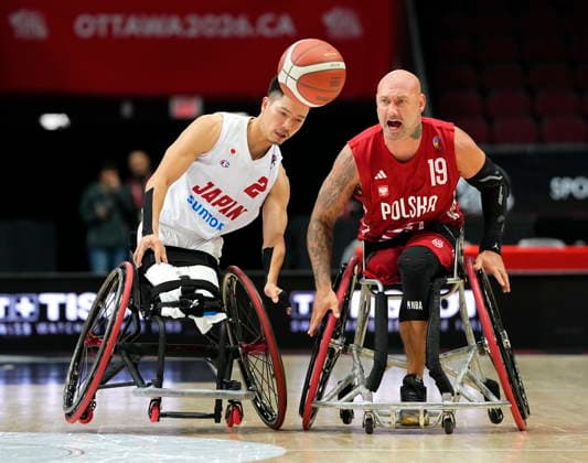 September 9, 2026, Ottawa, On, Canada: Poland s Mateusz Filipski (19) and Japan s Renshi Chokai (2) chase the ball during second half of IWBF Wheelchair Basketball World Championships group stage action, in Ottawa, on Wednesday, Sept. 9, 2026. Canada News - September 9, 2026  - ZUMAc35_ 20260909_zaf_c35_035 Copyright: xJustinxTangx