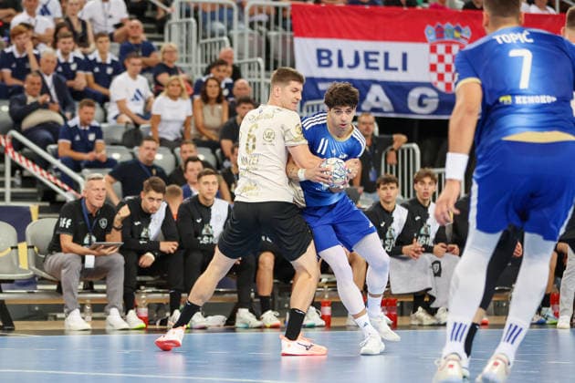 HC Zagreb v RK Celje Pivovarna Lasko - EHF Champions League Men Group Phase - Group C ZAGREB, CROATIA - SEPTEMBER 9: Tadej Mazej of RK Celje and Giorgi Tskhovrebadze of HC Zagreb in action during the EHF Champions League Men Group Phase match between HC Zagreb and RK Celje Pivovarna Lasko at Arena Zagreb on September 9, 2026 in Zagreb, Croatia.  MatijaxHabljak PIXSELL