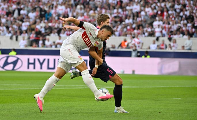 Tackle, Action: Ermedin Demirovic (VfB Stuttgart 09) vs. Henrik Heggheim (Viking FK Stavanger 05) Champions League: VfB Stuttgart vs. Viking FK Stavanger, September 9, 2026. DFL regulations prohibit any use of photographs as image SEQUENCES AND OR QUASI-VIDEO Champions League: VfB Stuttgart vs. Viking FK Stavanger