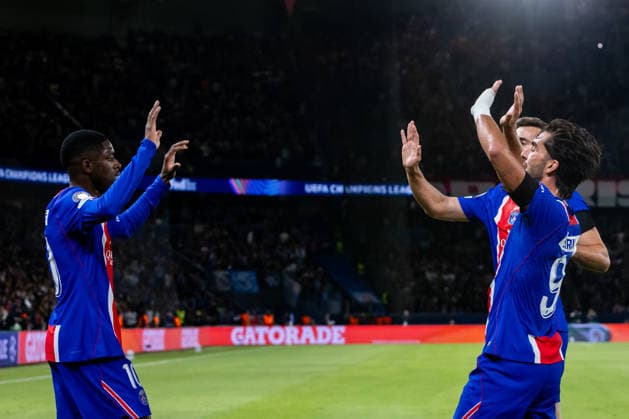 Ousmane Dembele of PSG with team PSG celebrating goal during UEFA Champions league League phase game between teams PSG and SK Slovan Bratislava (Dominika Kortvelyesiova Ball Raw Images) Paris Parc des Princes France Copyright: xDominikaxKortvelyesiovax DKR_9127