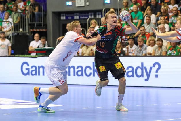 September 9, 2026, xgox, Handball EHF Champions League SC Magdeburg vs. Kolstad Handbold, Mikkel Vestli (Kolstad), 24, Gisli Thorgeir Kristjansson (Magdeburg), 10, tackle, duel, battle, Magdeburg