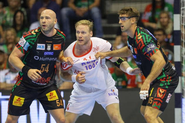 September 9, 2026, xtgx, Handball Champions League, SC Magdeburg Kolstad Handbold emspor, from left: Oscar Bergendahl (Magdeburg), 54, Magnus Gullerud (Kolstad), 14, Antonio Serradilla Cuenca (Magdeburg), 15, duel, battle, tackle (Magdeburg)