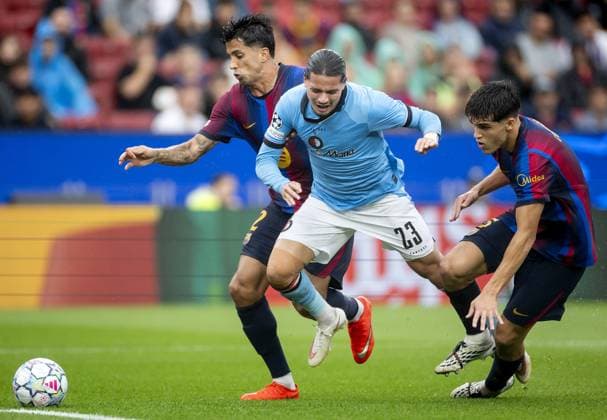 BARCELONA - (lr) Joao Cancelo of Barcelona, Anis Hadj Moussa of Feyenoord, Pau Cubarsi of Barcelona during the UEFA Champions League match between FC Barcelona, Barca and Feyenoord at Camp Nou on September 9, 2026 in Barcelona, Spain. KOEN VAN WEEL ANP UEFA Champions League 2026 27 xVIxANPxSportx xxANPxIVx 567783344 originalFilename: 567783344.jpg