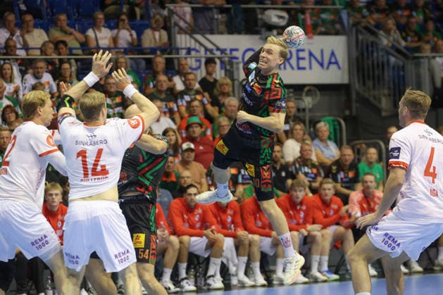 September 9, 2026, xtgx, Handball Champions League, SC Magdeburg vs. Kolstad Handbold Emspor, from left: Gisli, Thorgeir, Kristjansson (Magdeburg), 10 takes a shot, goal scorer, scores a goal, Magdeburg