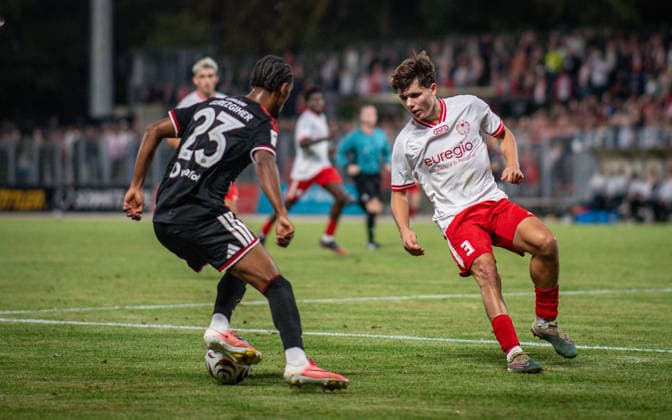 Soccer, 2026–2027 Season, Lower Rhine Cup, September 9, 2026, First Round, Men’s, SV Biemenhorst White vs. Fortuna Düsseldorf Black; from left: Filimon Gerezgiher (Fortuna Düsseldorf), Ferdinand Schulte (SV Biemenhorst); Bocholt, Stadion am Huenting, Germany 260909_fb_sv-biemenhorst_fortuna-duesseldorf_58605