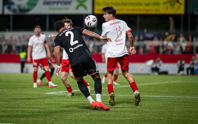 Soccer, 2026–2027 Season, Lower Rhine Cup, September 9, 2026, First Round, Men’s, SV Biemenhorst White vs. Fortuna Düsseldorf Black; from left: Steve Ako van der Sloot (Fortuna Düsseldorf), Ferdinand Schulte (SV Biemenhorst), Bocholt, Stadion am Huenting, Germany 260909_fb_sv-biemenhorst_fortuna-duesseldorf_58667