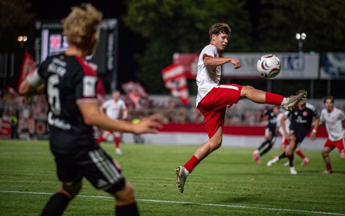 Soccer, 2026–2027 Season, Lower Rhine Cup, September 9, 2026, First Round, Men’s, SV Biemenhorst White vs. Fortuna Düsseldorf Black; from left: Andreas Mueller (Fortuna Düsseldorf), Ferdinand Schulte (SV Biemenhorst); Bocholt, Stadion am Huenting, Germany 260909_fb_sv-biemenhorst_fortuna-duesseldorf_58671
