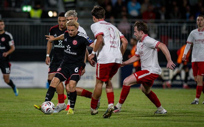 Soccer, 2026–2027 Season, Lower Rhine Cup, September 9, 2026, First Round, Men’s, SV Biemenhorst White vs. Fortuna Düsseldorf Black; from left: Andreas Mueller (Fortuna Düsseldorf), Max Peerenboom (SV Biemenhorst), Ferdinand Schulte (SV Biemenhorst), Niklas Laigre (SV Biemenhorst); Bocholt, Stadion am Huenting, Germany 260909_fb_sv-biemenhorst_fortuna-duesseldorf_58689