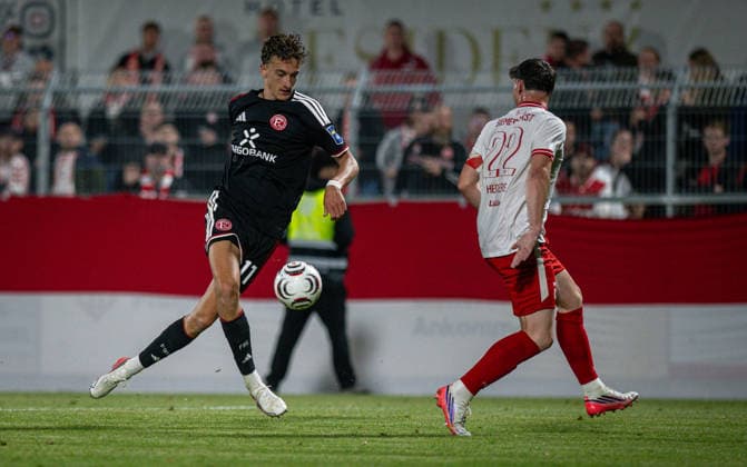 Soccer, 2026–2027 Season, Lower Rhine Cup, September 9, 2026, First Round, Men’s, SV Biemenhorst White vs. Fortuna Düsseldorf Black; from left: Lukas Eixler (Fortuna Düsseldorf), Justin Heckers (SV Biemenhorst), Bocholt, Stadion am Huenting, Germany 260909_fb_sv-biemenhorst_fortuna-duesseldorf_58693