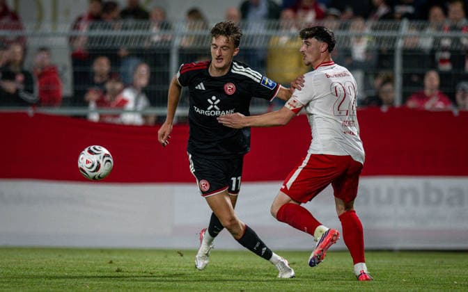 Soccer, 2026–2027 Season, Lower Rhine Cup, September 9, 2026, First Round, Men’s, SV Biemenhorst White vs. Fortuna Düsseldorf Black; from left: Lukas Eixler (Fortuna Düsseldorf), Justin Heckers (SV Biemenhorst), Bocholt, Stadion am Huenting, Germany 260909_fb_sv-biemenhorst_fortuna-duesseldorf_58694