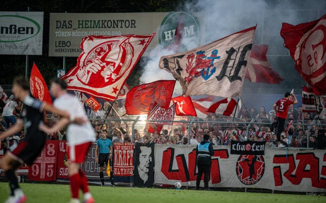 Soccer, 2026–2027 season, Lower Rhine Cup, September 9, 2026, First Round, Men s, SV Biemenhorst (White) vs. Fortuna Düsseldorf (Black), Fortuna Düsseldorf fans, Bocholt, Stadion am Huenting, Germany 260909_fb_sv-biemenhorst_fortuna-duesseldorf_58707