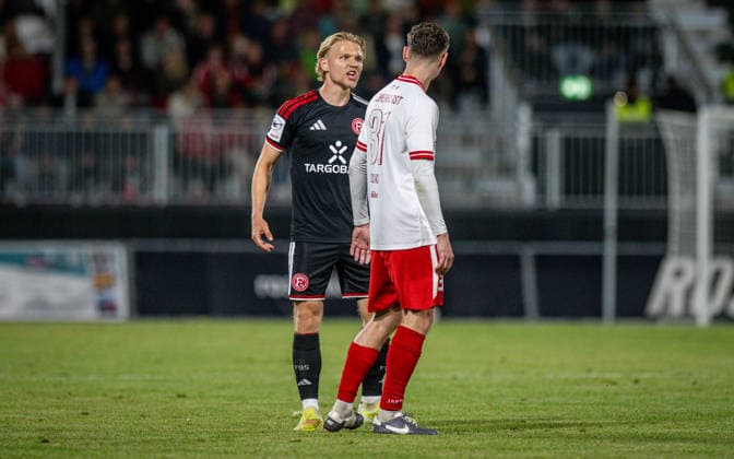 Soccer, 2026–2027 Season, Lower Rhine Cup, September 9, 2026, First Round, Men’s, SV Biemenhorst White vs. Fortuna Düsseldorf Black; from left: Andreas Mueller (Fortuna Düsseldorf), Taric Boland (SV Biemenhorst); Bocholt, Stadion am Huenting, Germany 260909_fb_sv-biemenhorst_fortuna-duesseldorf_58708