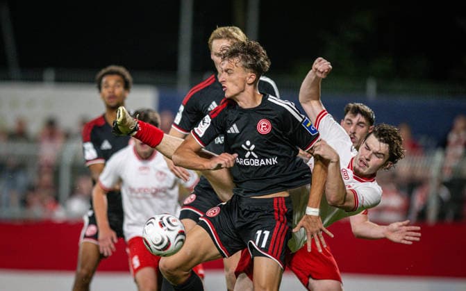Soccer, 2026–2027 Season, Lower Rhine Cup, September 9, 2026, First Round, Men’s, SV Biemenhorst White vs. Fortuna Düsseldorf Black; from left: Lukas Eixler (Fortuna Düsseldorf), Erik Monkos (SV Biemenhorst), Bocholt, Stadion am Huenting, Germany 260909_fb_sv-biemenhorst_fortuna-duesseldorf_58721