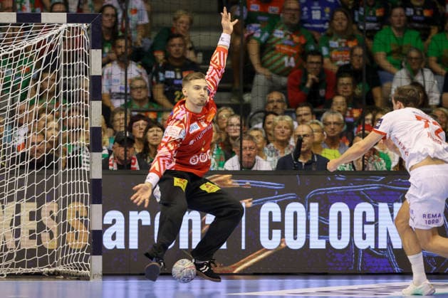 September 9, 2026, xtgx, Handball Champions League, SC Magdeburg vs. Kolstad Handbold Emspor, from left: Dominik Kuzmanovic (Magdeburg), 1 save, blocks the ball, catches the ball, makes a save (Magdeburg)