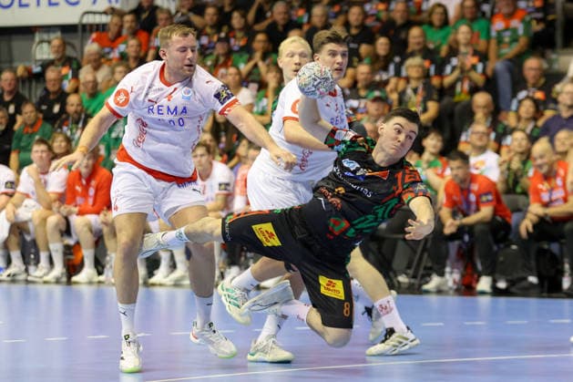 September 9, 2026, xtgx, Handball Champions League, SC Magdeburg vs. Kolstad Handbold Emspor, from left: Tim Thielecke (Magdeburg), 8 shots on goal, goal scorer, scores a goal, Magdeburg