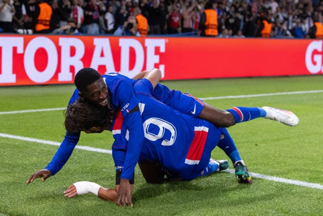 Ousmane Dembele of PSG and Ferran Torres of PSG during UEFA Champions league League phase game between teams PSG and SK Slovan Bratislava (Dominika Kortvelyesiova Ball Raw Images) Paris Parc des Princes France Copyright: xDominikaxKortvelyesiovax DKR_9253