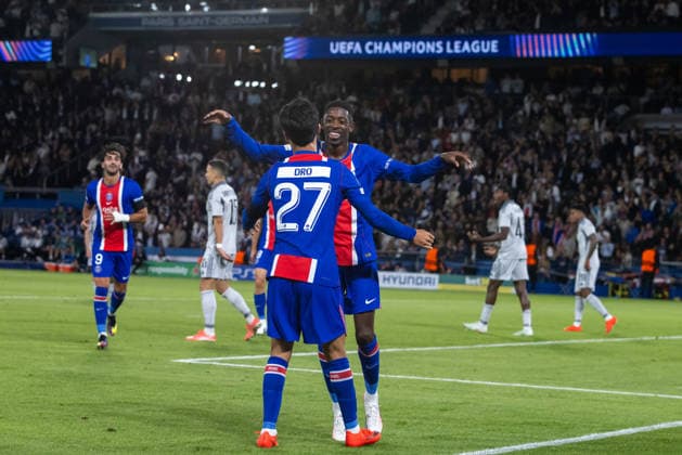Dro Fernandez of PSG and Ousmane Dembele of PSG during UEFA Champions league League phase game between teams PSG and SK Slovan Bratislava (Dominika Kortvelyesiova Ball Raw Images) Paris Parc des Princes France Copyright: xDominikaxKortvelyesiovax DKR_9189