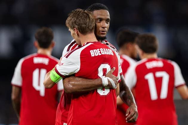 Martin odegaard of Arsenal celebrates his goal with Ezri Konsa of Arsenal Napoli v Arsenal, UEFA Champions League, League Stage, Football, Stadio Diego Armando Maradona, Naples, Italy - 09 Sep 2026Naples Stadio Diego Armando Maradona Italy  Copyright: xMarcoxIacobucci Shutterstockx 17140214gt