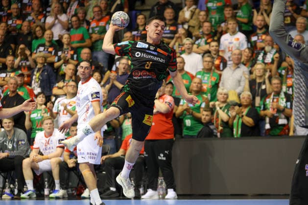 September 9, 2026, xtgx, Handball Champions League, SC Magdeburg vs. Kolstad Handbold Emspor, from left: Tim Thielecke (Magdeburg), takes 8 shots on goal, goal scorer, scores a goal, Magdeburg
