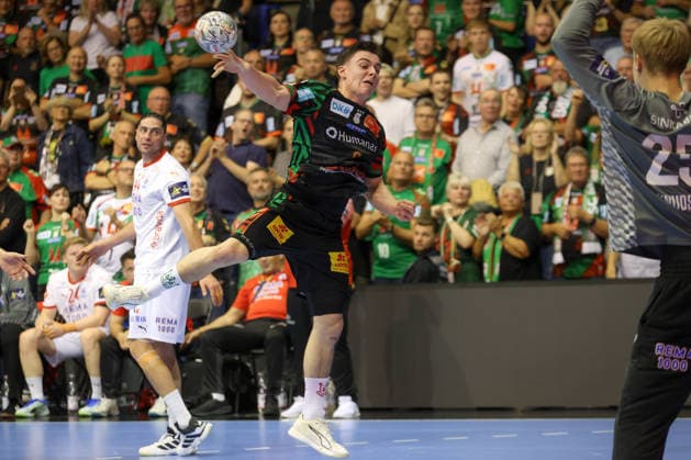 September 9, 2026, xtgx, Handball Champions League, SC Magdeburg vs. Kolstad Handbold Emspor, from left: Tim Thielecke (Magdeburg), takes 8 shots on goal, goal scorer, scores a goal, Magdeburg