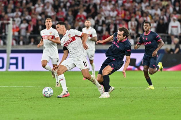 STUTTGART, GERMANY; 09. SEPTEMBER: tackle between Bilal EL KHANNOUSS (VfB Stuttgart 11) and Joe BELL (Viking FK 8) during the Champions League Match between VfB Stuttgart vs. Viking FK at Matchday 1 at MHP-Arena Copyright: xBEAUTIFULxSPORTS Goldbergx