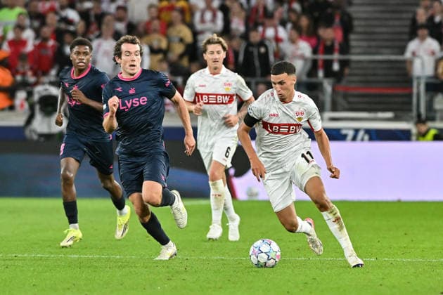 STUTTGART, GERMANY; 09. SEPTEMBER: tackle between Bilal EL KHANNOUSS (VfB Stuttgart 11) and Joe BELL (Viking FK 8) during the Champions League Match between VfB Stuttgart vs. Viking FK at Matchday 1 at MHP-Arena Copyright: xBEAUTIFULxSPORTS Goldbergx