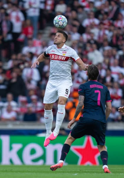 Ermedin Demirovic of VfB Stuttgart in aerial duel with Kristoffer Askildsen of Viking FK during UEFA Champions League - Matchday 1 season 26 27 game between Stuttgart and Viking (Ruslan Taran Ball Raw Images) Stuttgart MHP Arena Germany Copyright: xRuslanxTaranx RUS_STUTT-VIKING-0074