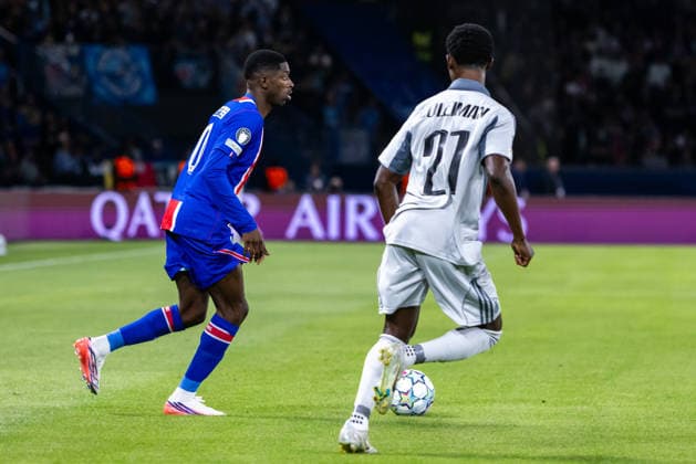 Ousmane Dembele of PSG and Suleiman Camara of SK Slovan Bratislava during UEFA Champions league League phase game between teams PSG and SK Slovan Bratislava (Dominika Kortvelyesiova Ball Raw Images) Paris Parc des Princes France Copyright: xDominikaxKortvelyesiovax DKR_8925