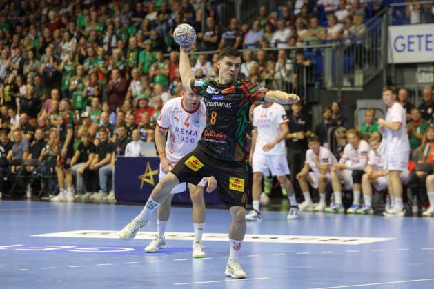 September 9, 2026, xtgx, Handball Champions League, SC Magdeburg vs. Kolstad Handbold emspor, from left: Tim Thielecke (Magdeburg), 8 shots on goal, goal scorer, scores a goal, goal, scores the goal (seven-meter throw, Magdeburg)