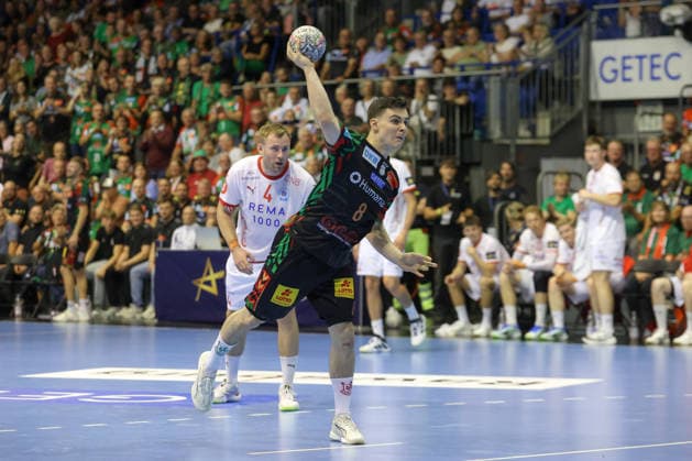 September 9, 2026, xtgx, Handball Champions League, SC Magdeburg vs. Kolstad Handbold emspor, from left: Tim Thielecke (Magdeburg), 8 shots on goal, goal scorer, scores a goal, goal, scores the goal (seven-meter throw, Magdeburg)