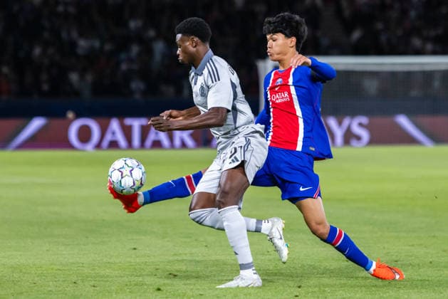 Suleiman Camara of SK Slovan Bratislava and Dro Fernandez of PSG during UEFA Champions league League phase game between teams PSG and SK Slovan Bratislava (Dominika Kortvelyesiova Ball Raw Images) Paris Parc des Princes France Copyright: xDominikaxKortvelyesiovax DKR_9002