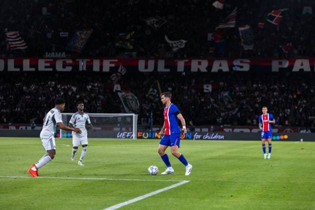 Cesar Blackman of SK Slovan Bratislava and Fabian Ruiz of PSG during UEFA Champions league League phase game between teams PSG and SK Slovan Bratislava (Dominika Kortvelyesiova Ball Raw Images) Paris Parc des Princes France Copyright: xDominikaxKortvelyesiovax DKR_9351