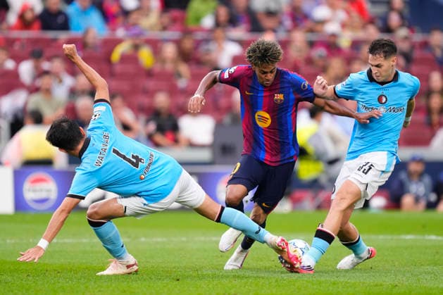 FC Barcelona, Barca v Feyenoord - UEFA Champions League 2026 27 League Phase MD1 Mika Marmol centre-back of Feyenoord and Spain and Tsuyoshi Watanabe centre-back of Feyenoord and Japan and Lamine Yamal right winger of Barcelona and Spain compete for the ball during the UEFA Champions League 2026 27 League Phase MD1 match between FC Barcelona and Feyenoord at Camp Nou on September 9, 2026 in Barcelona, Spain. Barcelona Spain  Copyright: xJosexBretonx originalFilename:bretonhernandez-fcbarcel260909_npcyW.jpg