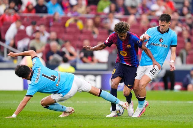 FC Barcelona, Barca v Feyenoord - UEFA Champions League 2026 27 League Phase MD1 Mika Marmol centre-back of Feyenoord and Spain and Tsuyoshi Watanabe centre-back of Feyenoord and Japan and Lamine Yamal right winger of Barcelona and Spain compete for the ball during the UEFA Champions League 2026 27 League Phase MD1 match between FC Barcelona and Feyenoord at Camp Nou on September 9, 2026 in Barcelona, Spain. Barcelona Spain  Copyright: xJosexBretonx originalFilename:bretonhernandez-fcbarcel260909_npjCl.jpg