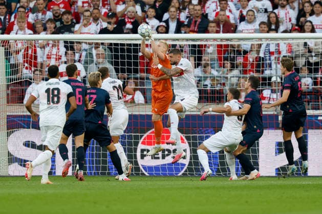 Goalkeeper Arild Ostbo of Viking FK clears the ball ahead of Jeff Chabot of VfB Stuttgart during the UEFA Champions League match between VfB Stuttgart and Viking FK at the MHP Arena, Stuttgart, Germany, on September 9, 2026, in action during the UEFA Champions League match between VfB Stuttgart and Viking FK at the MHP Arena, Stuttgart, Germany, on September 9, 2026 Copyright: HMBxMedia xHeikoxBecker