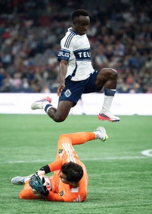 September 9, 2026, Vancouver, Bc, CANADA: Vancouver Whitecaps Cheick Sabaly, top, jumps over Los Angeles Galaxy goalkeeper JT Marcinkowski during the first half of an MLS, Fussball Herren, USA soccer match in Vancouver on Wednesday, Sept. 9, 2026. Canada News - September 9, 2026 - ZUMAc35_ 20260909_zaf_c35_151 Copyright: xEthanxCairnsx