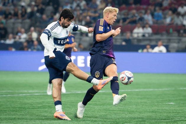 September 9, 2026, Vancouver, Bc, CANADA: Vancouver Whitecaps Brian White (left) kicks the ball to score as Los Angeles Galaxy s Jakob Glesnes (5) defends during the first half of an MLS, Fussball Herren, USA soccer match in Vancouver on Wednesday, Sept. 9, 2026. Canada News - September 9, 2026  - ZUMAc35_ 20260909_zaf_c35_156 Copyright: xEthanxCairnsx