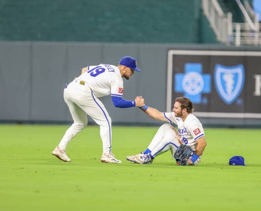 SEP 9, 2026: Kansas City Royals infielder Michael Massey (19) helps up Kansas City Royals outfielder John Rave (16) after making a diving catch in the 4th inning against the Diamondbacks at Kauffman Stadium Kansas City, MO. CSM Kansas City United States - ZUMAc04_ 20260909_zma_c04_139 Copyright: xRomanxPunox