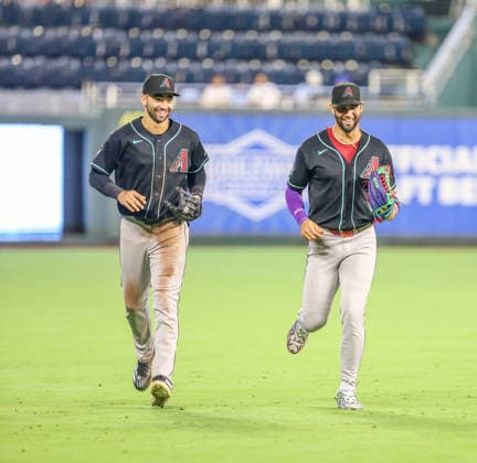 SEP 9, 2026: Arizona Diamondbacks center fielder Jordan Lawlar (10) and Arizona Diamondbacks outfielder Lourdes Gurriel Jr. (12) comes off the field in the 6th inning against the Kansas City Royals at Kauffman Stadium Kansas City, MO. CSM Kansas City United States - ZUMAc04_ 20260909_zma_c04_157 Copyright: xRomanxPunox
