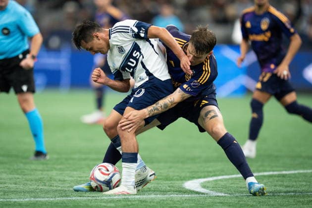 September 9, 2026, Vancouver, Bc, CANADA: Vancouver Whitecaps Andres Cubas, left, and Los Angeles Galaxy s Robert Taylor vie for the ball during the second half of an MLS, Fussball Herren, USA soccer match in Vancouver on Wednesday, Sept. 9, 2026. Canada News - September 9, 2026 - ZUMAc35_ 20260909_zaf_c35_169 Copyright: xEthanxCairnsx