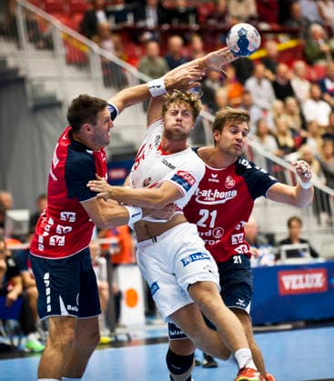 Drotts Anton Andersson and Flensburgs Tobias Karlsson during the Champions League match between Drott and Flensburg on September 25, 2013, in Halmstad, Sweden  Copyright: xAvdoxBilkanovicx